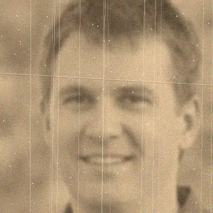 An old, faded and scratched portrait